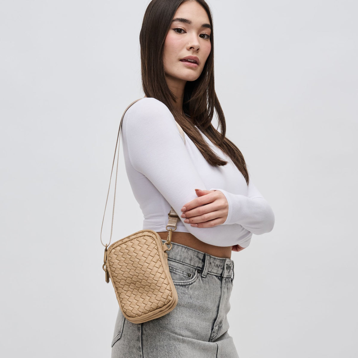 Woman wearing Nude Sol and Selene Divide & Conquer - Woven Neoprene Crossbody 841764108713 View 1 | Nude