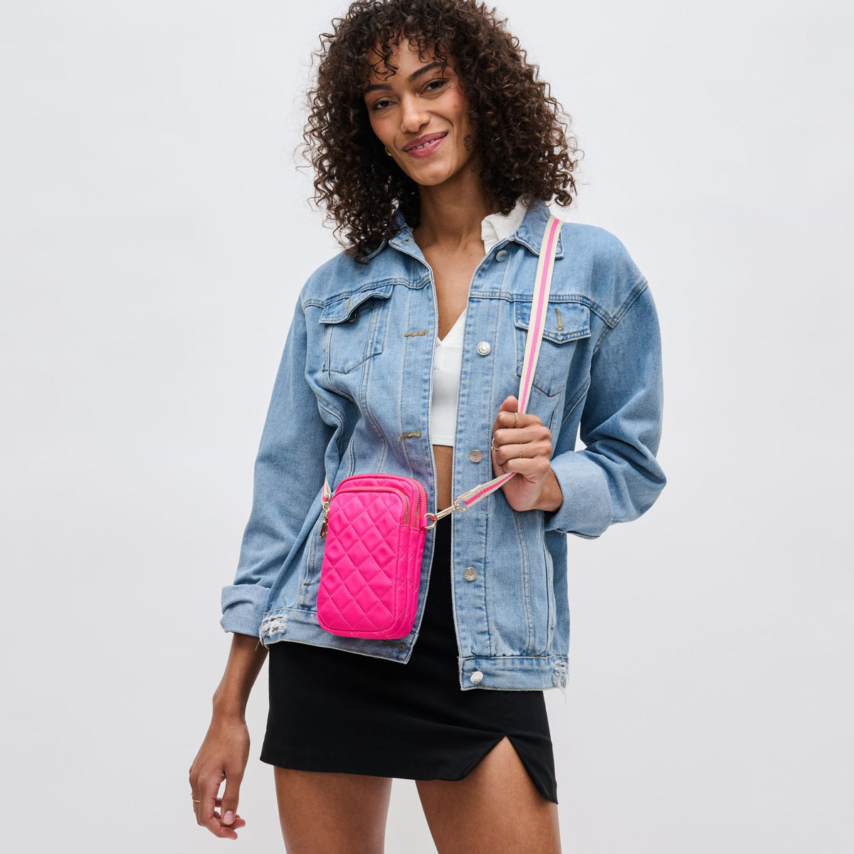 Woman wearing Magenta Sol and Selene Divide & Conquer - Quilted Crossbody 841764108027 View 1 | Magenta