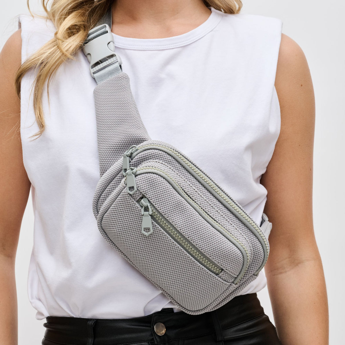 Woman wearing Grey Sol and Selene Hip Hugger - Neoprene Mesh Belt Bag 841764109871 View 1 | Grey