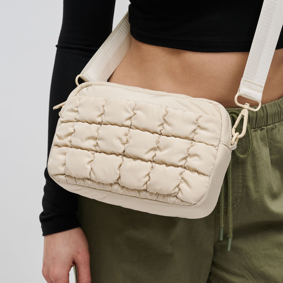 Woman wearing Cream Sol and Selene Inspiration - Quilted Nylon Crossbody 841764108430 View 4 | Cream