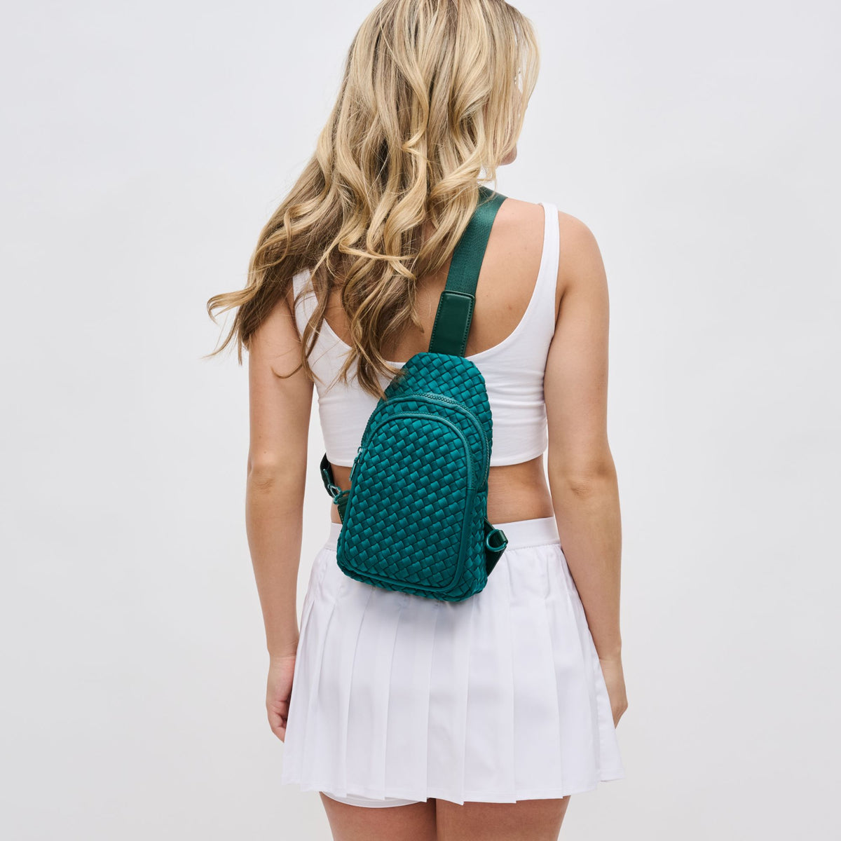 Woman wearing Forest Sol and Selene Beyond The Horizon - Woven Neoprene Sling Backpack 841764108089 View 2 | Forest