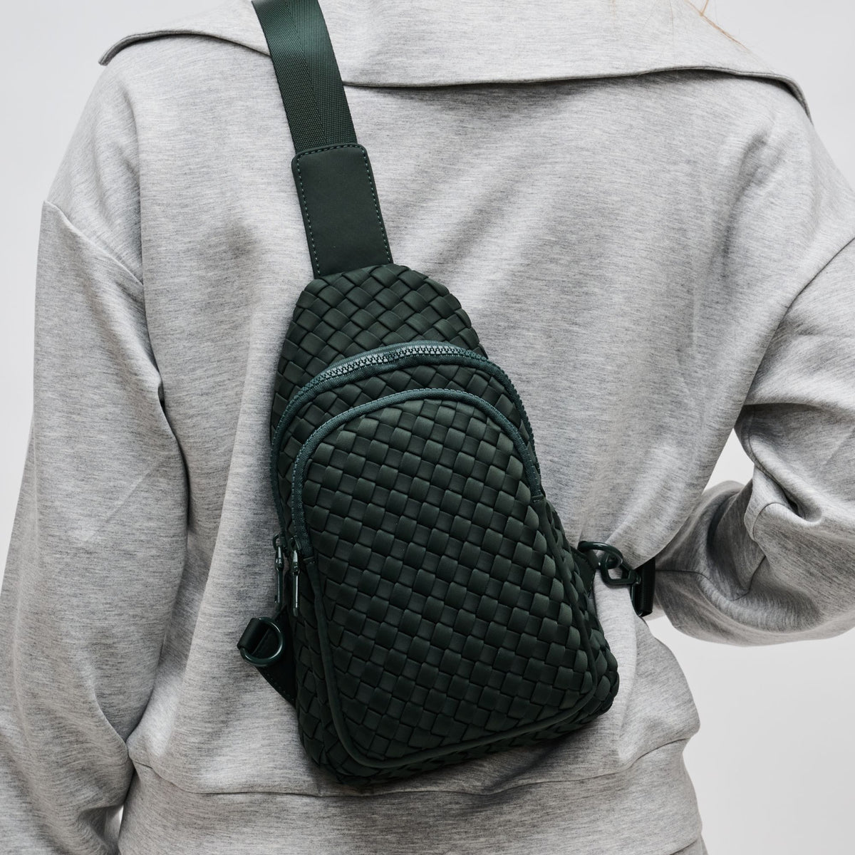 Woman wearing Olive Sol and Selene Beyond The Horizon - Woven Neoprene Sling Backpack 841764109079 View 4 | Olive