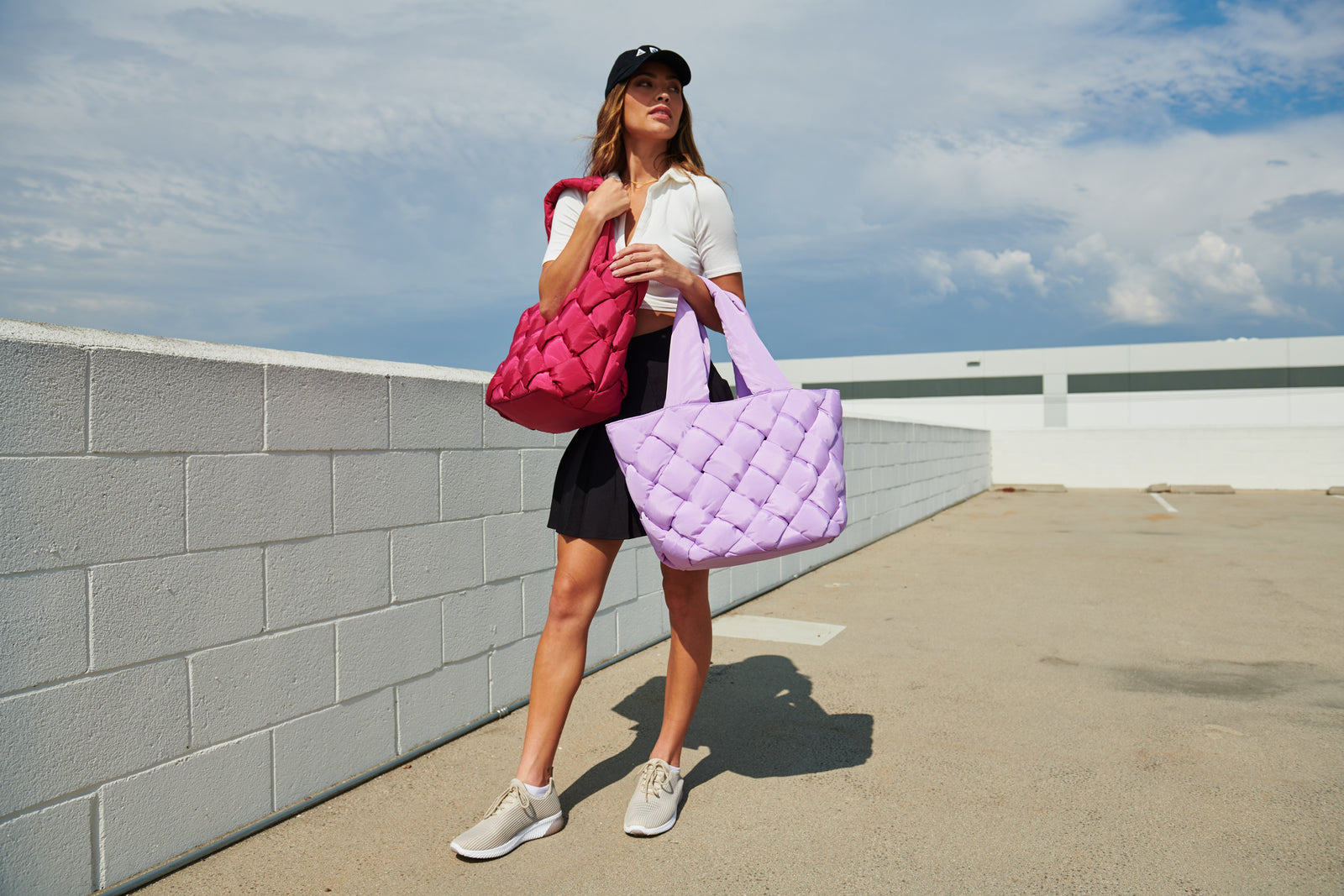 model carrying cloud tote bags