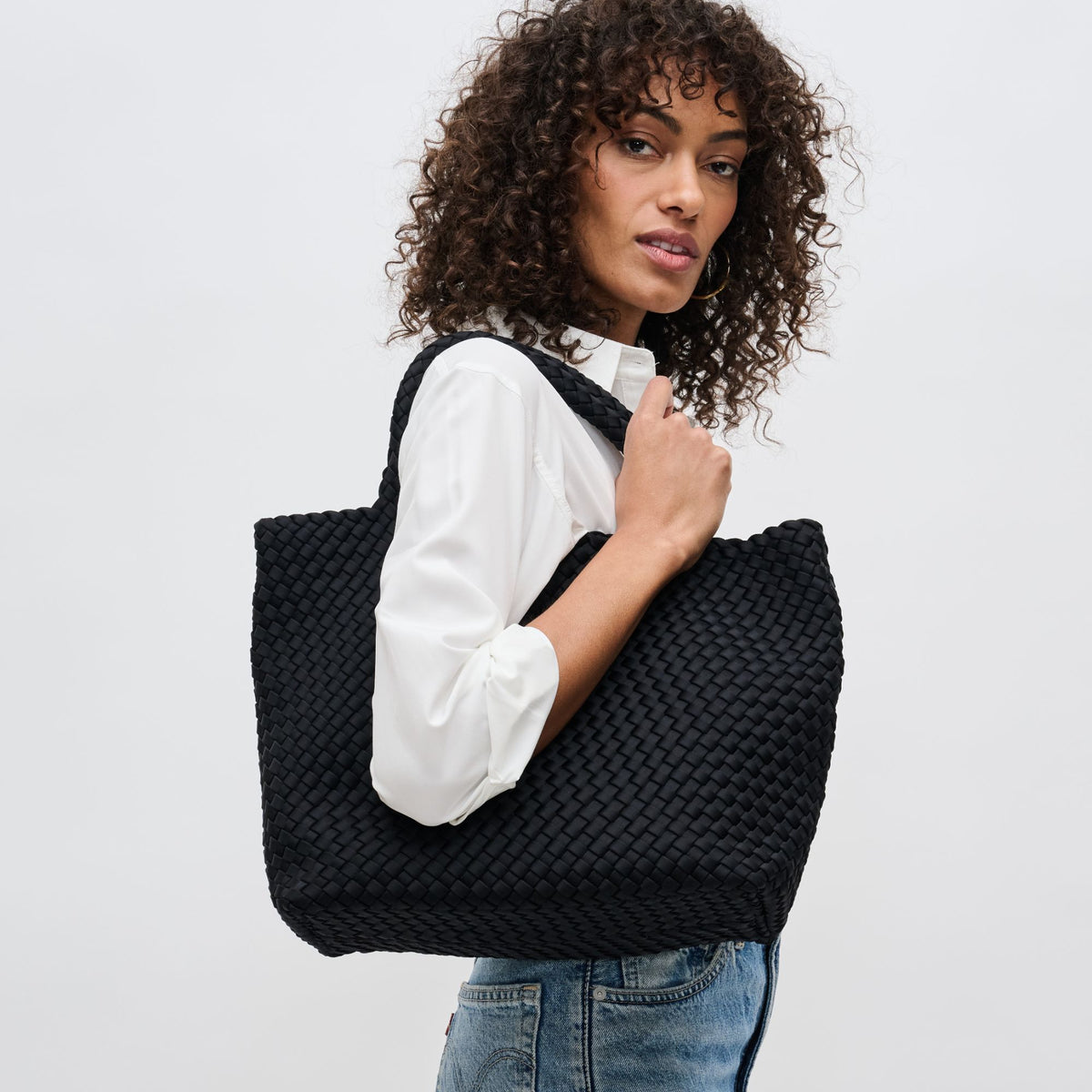 Woman wearing Black Sol and Selene Sky's The Limit - Medium Tote 841764107778 View 2 | Black