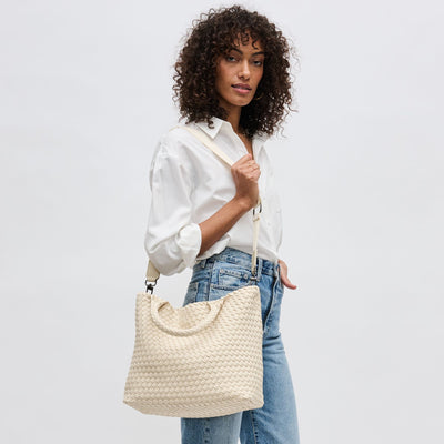 Woman wearing Cream Sol and Selene Sky's The Limit - Medium Tote 841764109246 View 1 | Cream