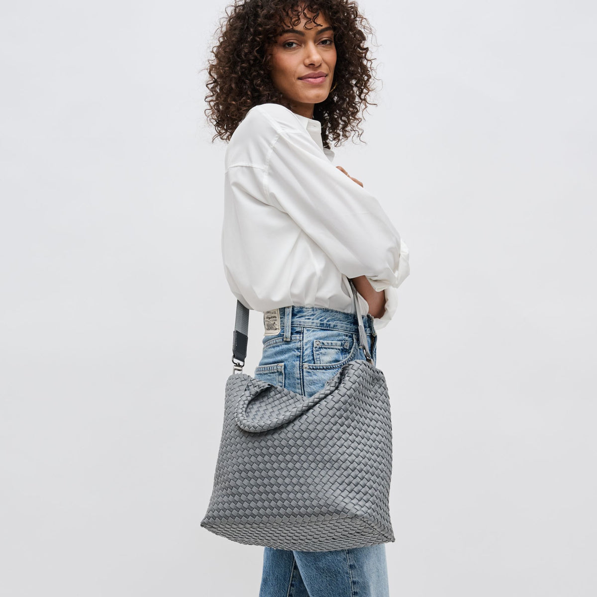 Woman wearing Grey Sol and Selene Sky's The Limit - Medium Tote 841764108171 View 3 | Grey