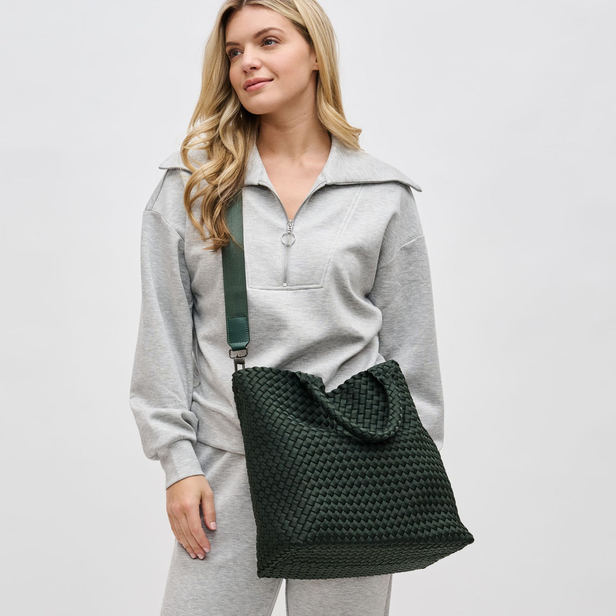 Woman wearing Olive Sol and Selene Sky's The Limit - Medium Tote 841764108843 View 2 | Olive