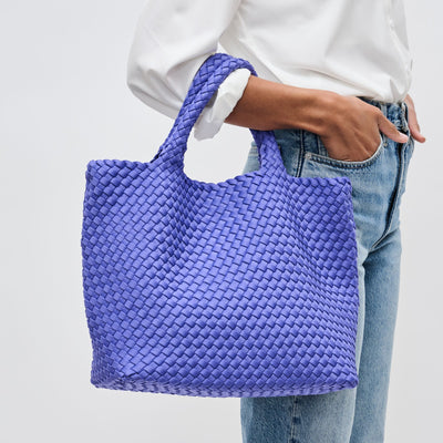 Woman wearing Periwinkle Sol and Selene Sky's The Limit - Medium Tote 841764108799 View 1 | Periwinkle