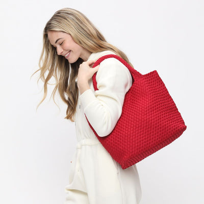 Woman wearing Red Sol and Selene Sky's The Limit - Medium Tote 841764108188 View 1 | Red