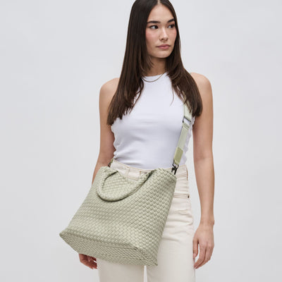Woman wearing Sage Sol and Selene Sky's The Limit - Medium Tote 841764108867 View 1 | Sage