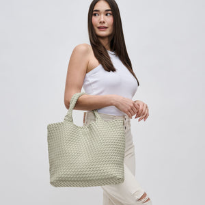 Woman wearing Sage Sol and Selene Sky's The Limit - Medium Tote 841764108867 View 3 | Sage