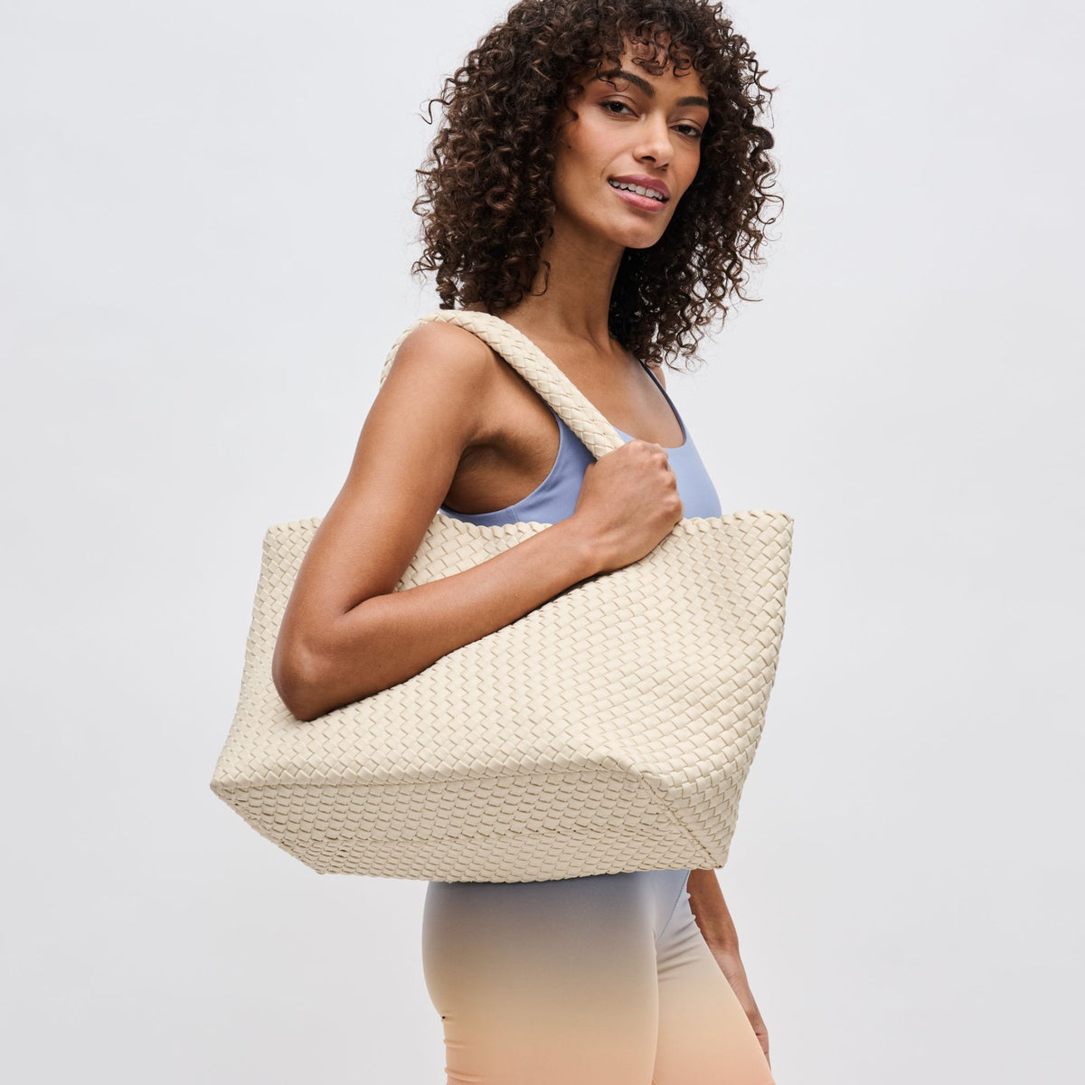 Woman wearing Cream Sol and Selene Sky's The Limit - Large Tote 841764109253 View 2 | Cream