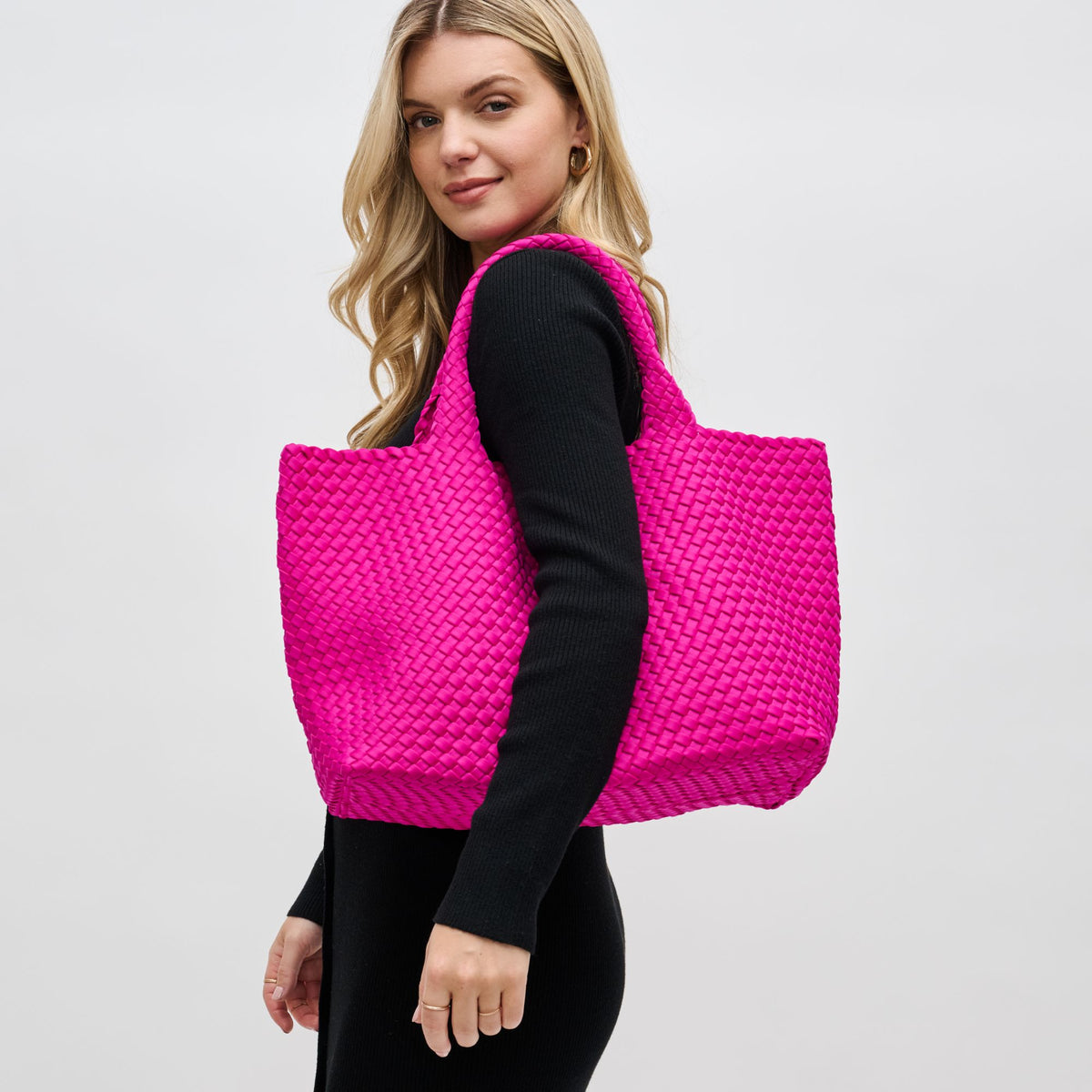 Woman wearing Fuchsia Sol and Selene Sky's The Limit - Large Tote 841764107860 View 3 | Fuchsia