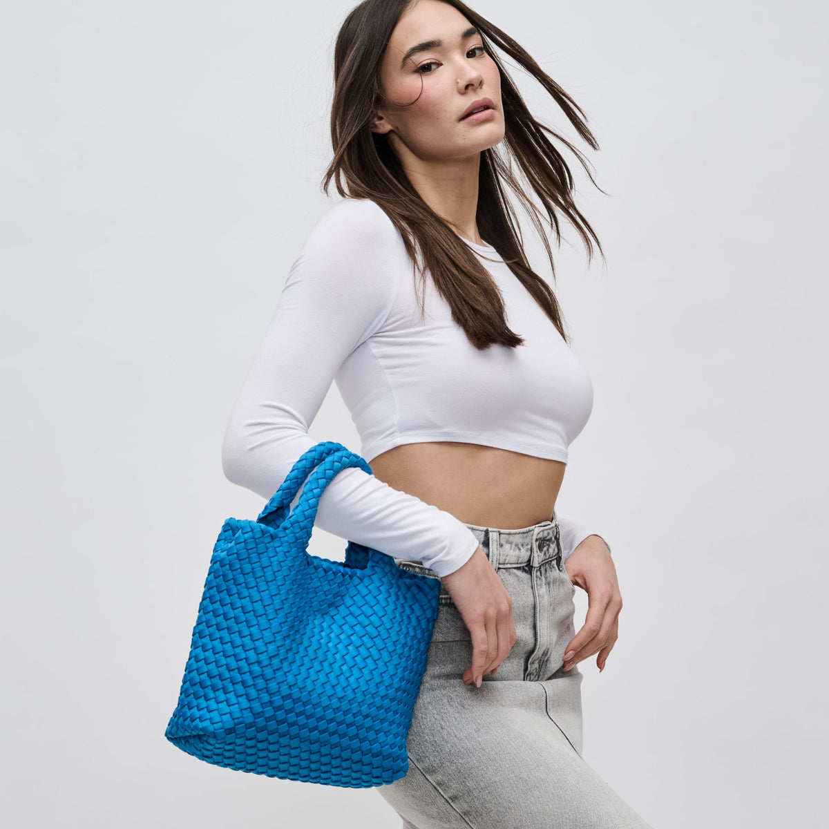 Woman wearing Ocean Sol and Selene Sky's The Limit - Small Crossbody 841764109017 View 3 | Ocean
