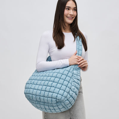Woman wearing Sky Blue Sol and Selene Revive Hobo 841764109529 View 1 | Sky Blue