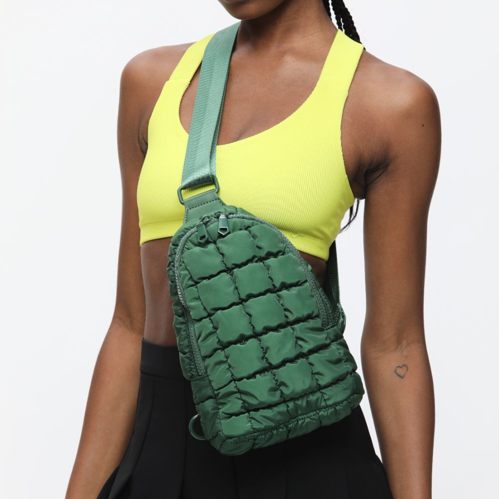 Woman wearing Emerald Sol and Selene Rejuvenate Sling Backpack 841764108645 View 1 | Emerald
