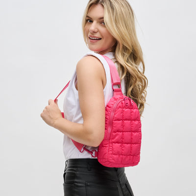 Woman wearing Hot Pink Sol and Selene Rejuvenate Sling Backpack 841764109611 View 1 | Hot Pink