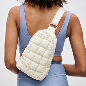Woman wearing Ivory Sol and Selene Rejuvenate Sling Backpack 841764109604 View 1 | Ivory