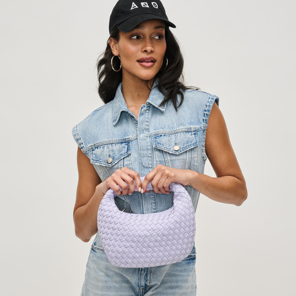 Woman wearing Lilac Sol and Selene Dare to Dream - Small Woven Neoprene Clutch 841764111515 View 1 | Lilac