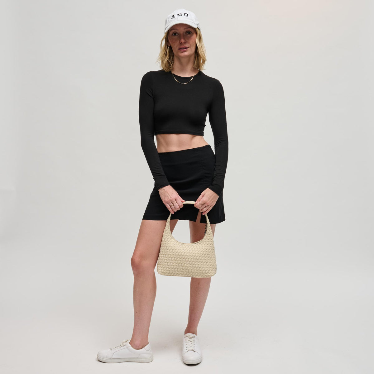 Woman wearing Cream Sol and Selene Harmonia - Woven Neoprene Shoulder Bag 841764112543 View 4 | Cream