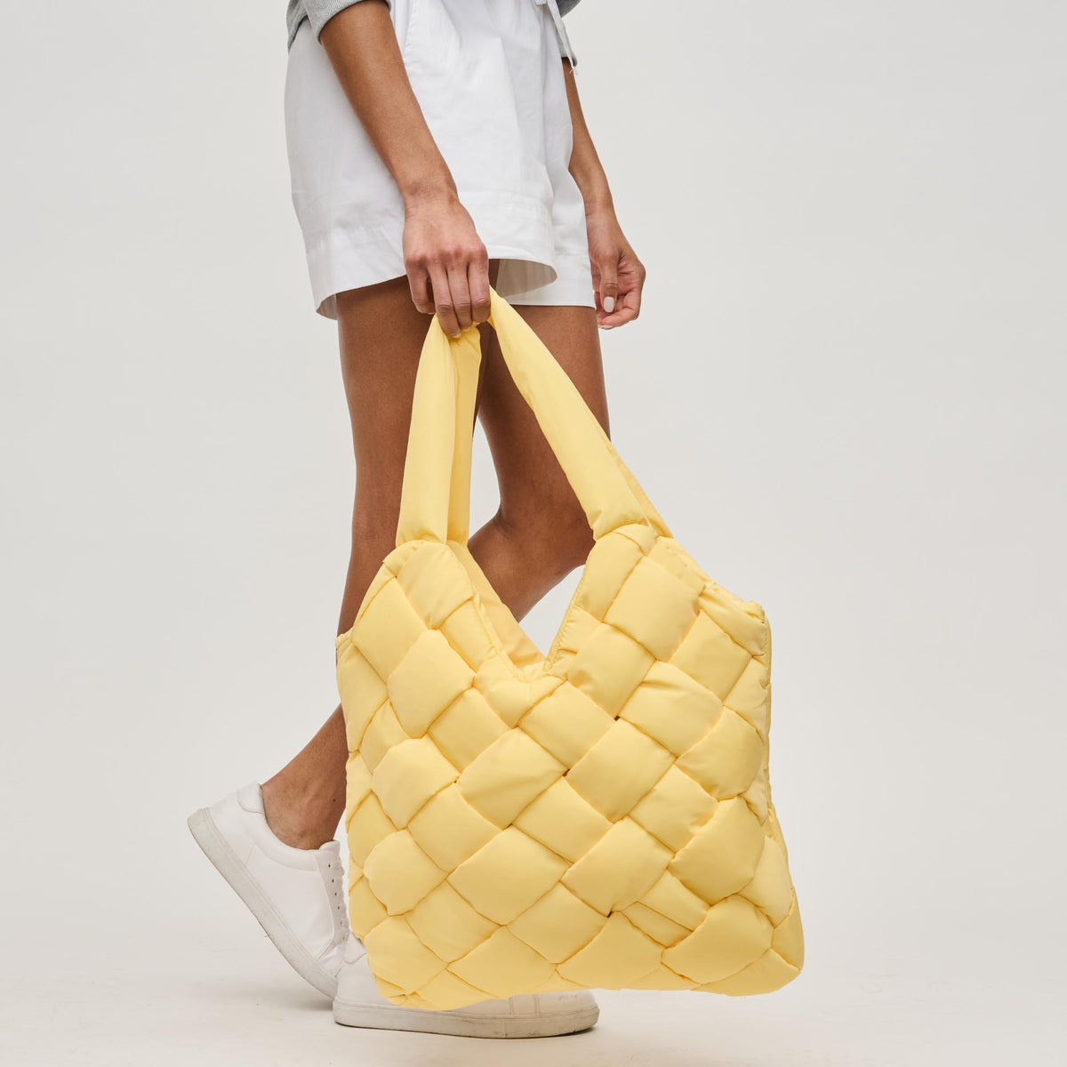 Woman wearing Butter Sol and Selene Illumine Tote 841764111904 View 4 | Butter