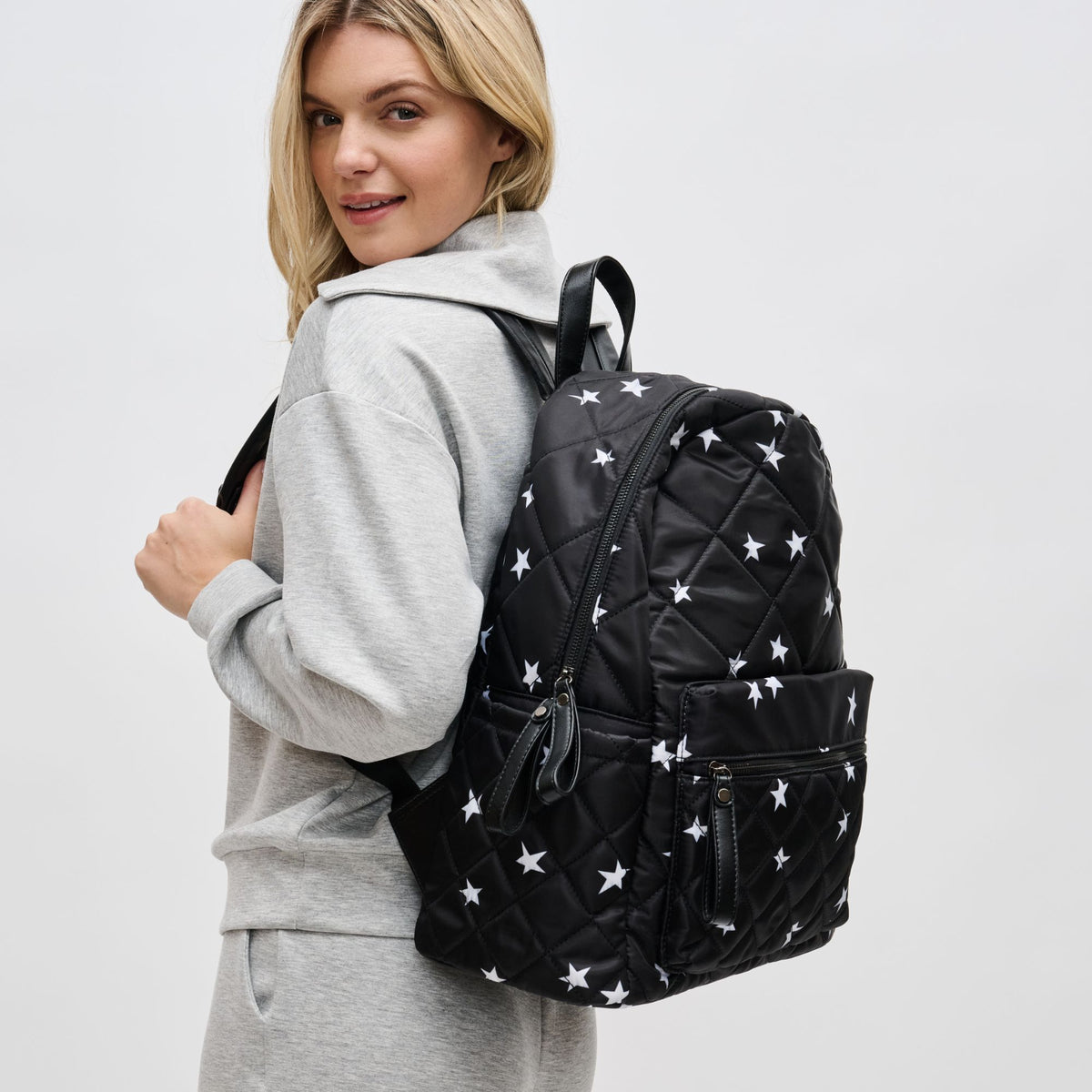Woman wearing Black Star Sol and Selene Motivator - Large Travel Backpack 841764107426 View 2 | Black Star