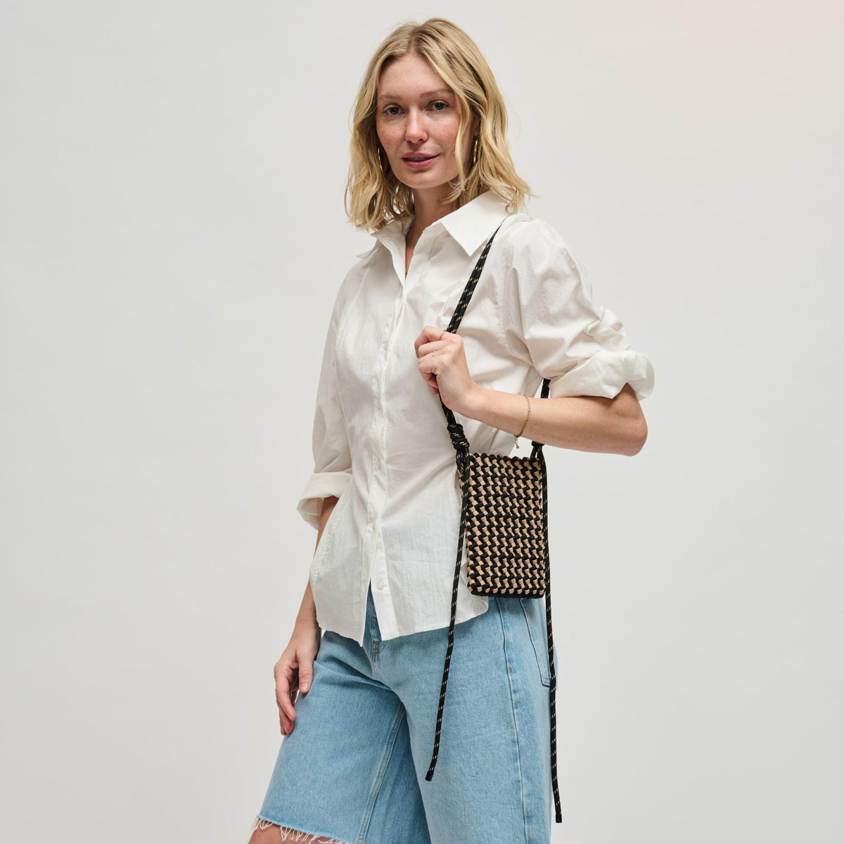Woman wearing Black Nude Sol and Selene Eos Cell Phone Crossbody 841764113069 View 3 | Black Nude
