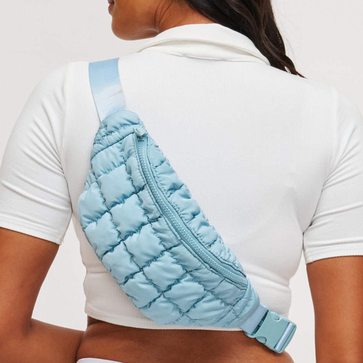Woman wearing Sky Blue Sol and Selene Resurgence Belt Bag 841764109659 View 4 | Sky Blue