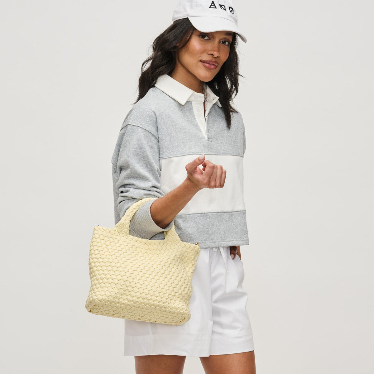 Woman wearing Butter Sol and Selene Sky's The Limit - Small Laced Up Eco-Edition Crossbody 841764111706 View 3 | Butter