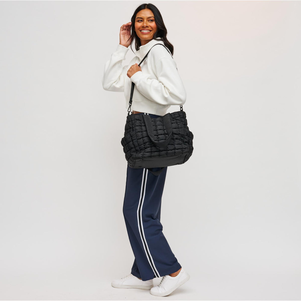 Woman wearing Black Sol and Selene Dreamer Tote 841764108447 View 2 | Black