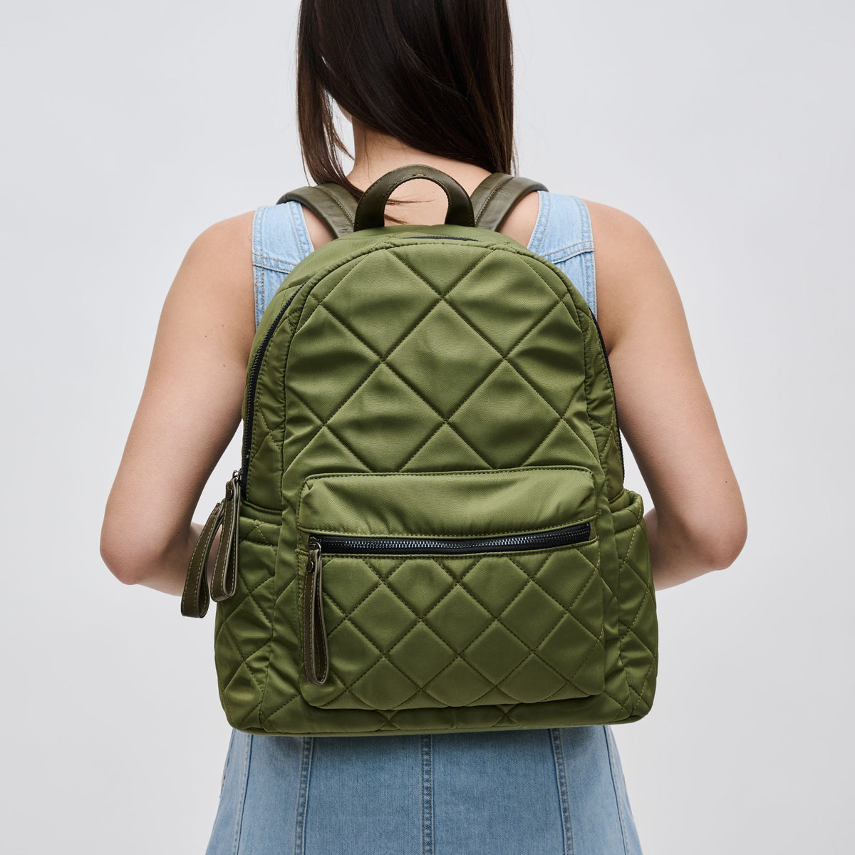Woman wearing Olive Sol and Selene Motivator - Medium Backpack 841764100083 View 1 | Olive