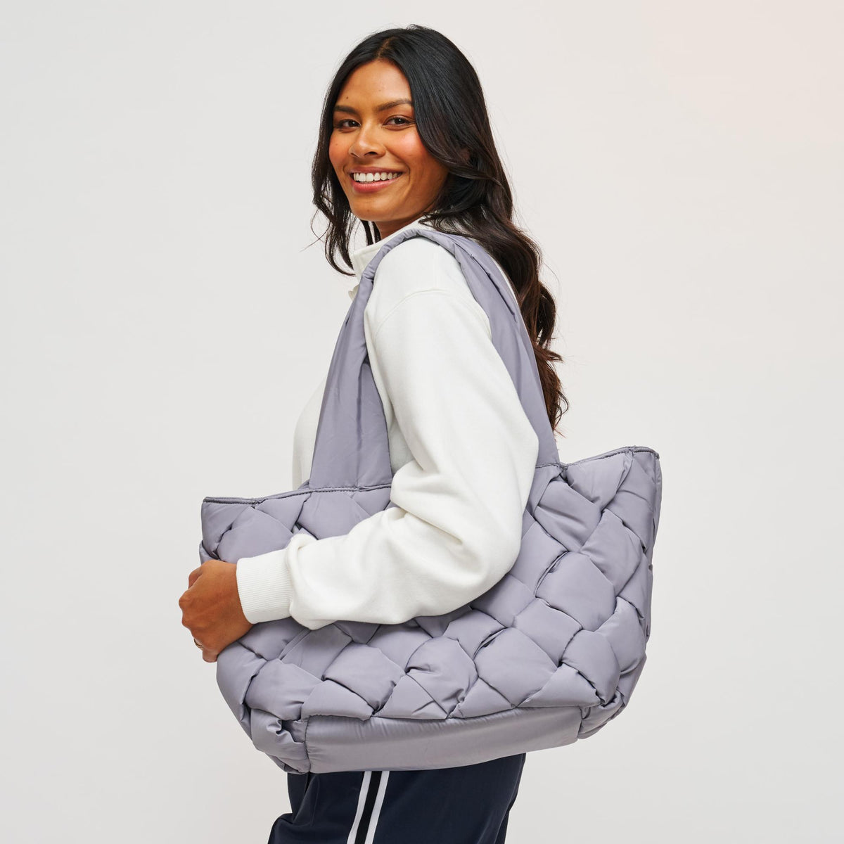 Woman wearing Carbon Sol and Selene Intuition East West Tote 841764107334 View 1 | Carbon