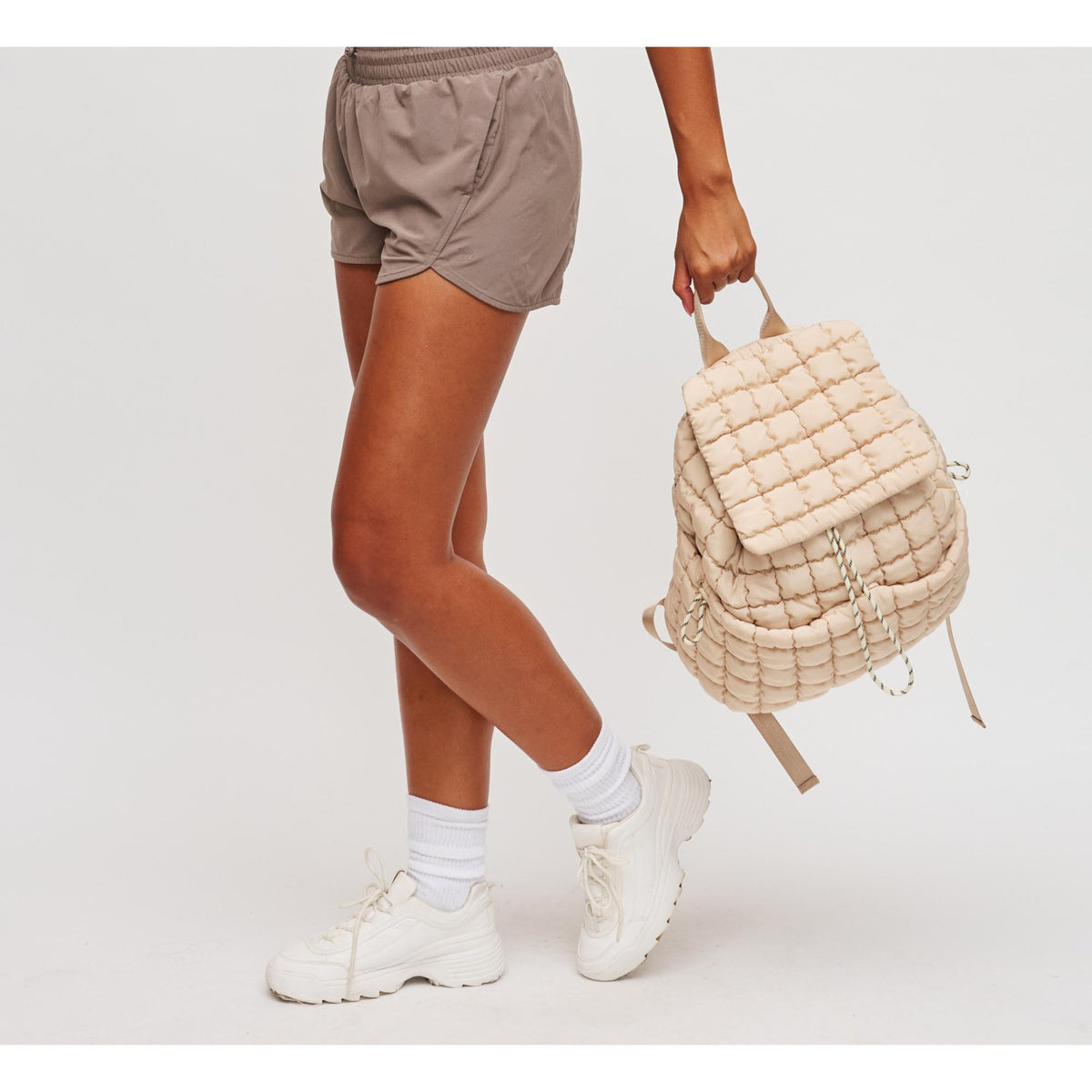 Woman wearing Cream Sol and Selene Vitality Backpack 841764109888 View 4 | Cream