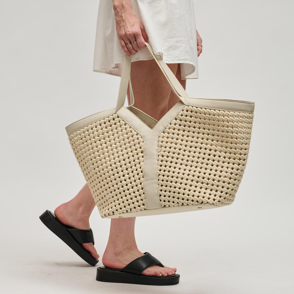 Woman wearing Cream Sol and Selene Calypso Tote 841764112932 View 3 | Cream