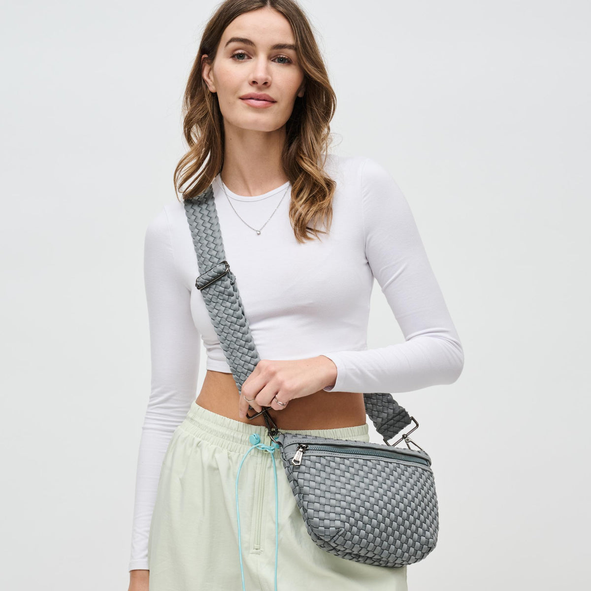 Woman wearing Grey Sol and Selene Ethereal - Woven Neoprene Crossbody 841764110877 View 3 | Grey