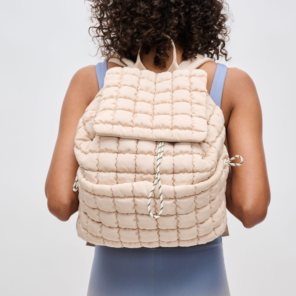 Woman wearing Cream Sol and Selene Vitality Backpack 841764109888 View 1 | Cream