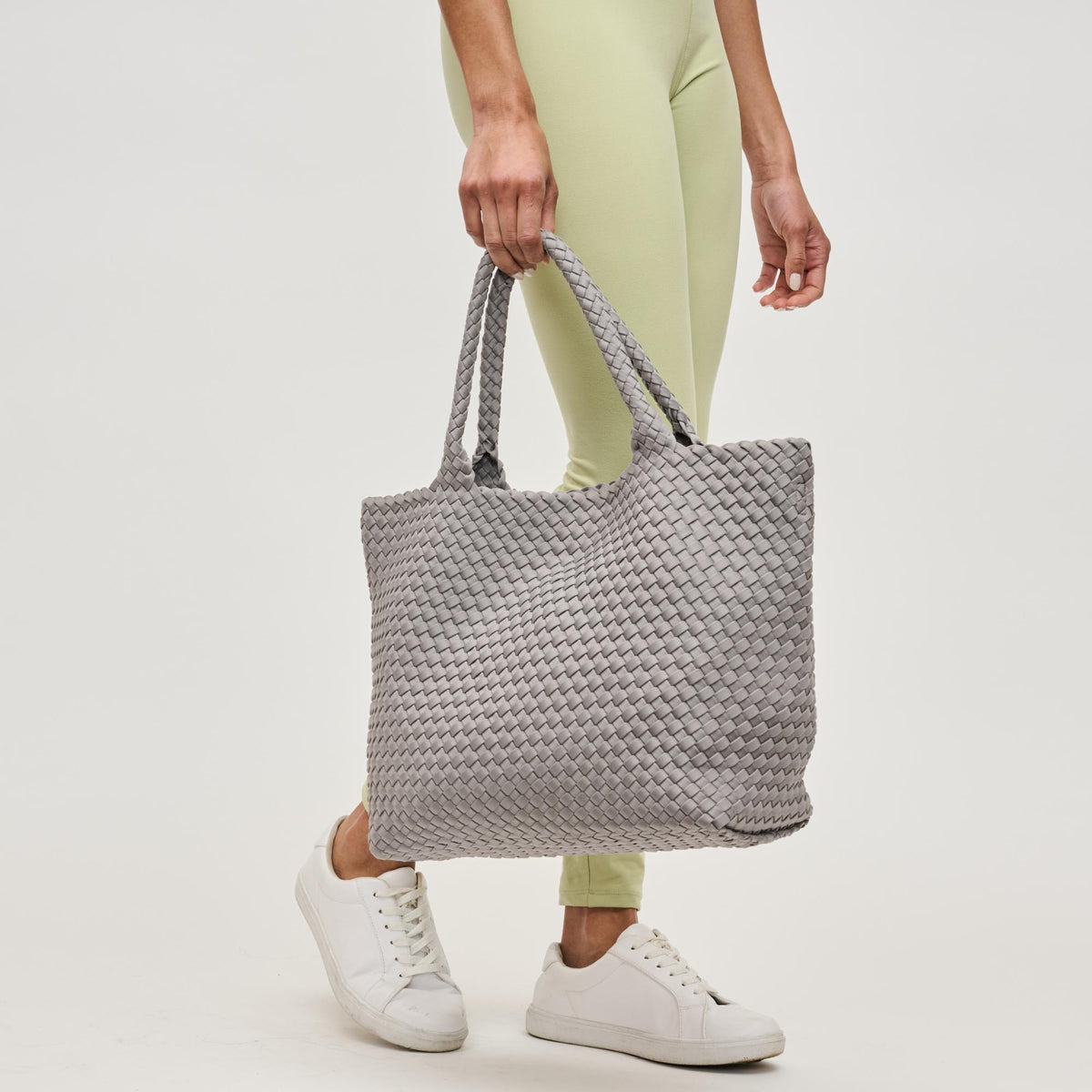 Woman wearing Fog Sol and Selene Sky's The Limit - Medium Tote 841764111300 View 4 | Fog