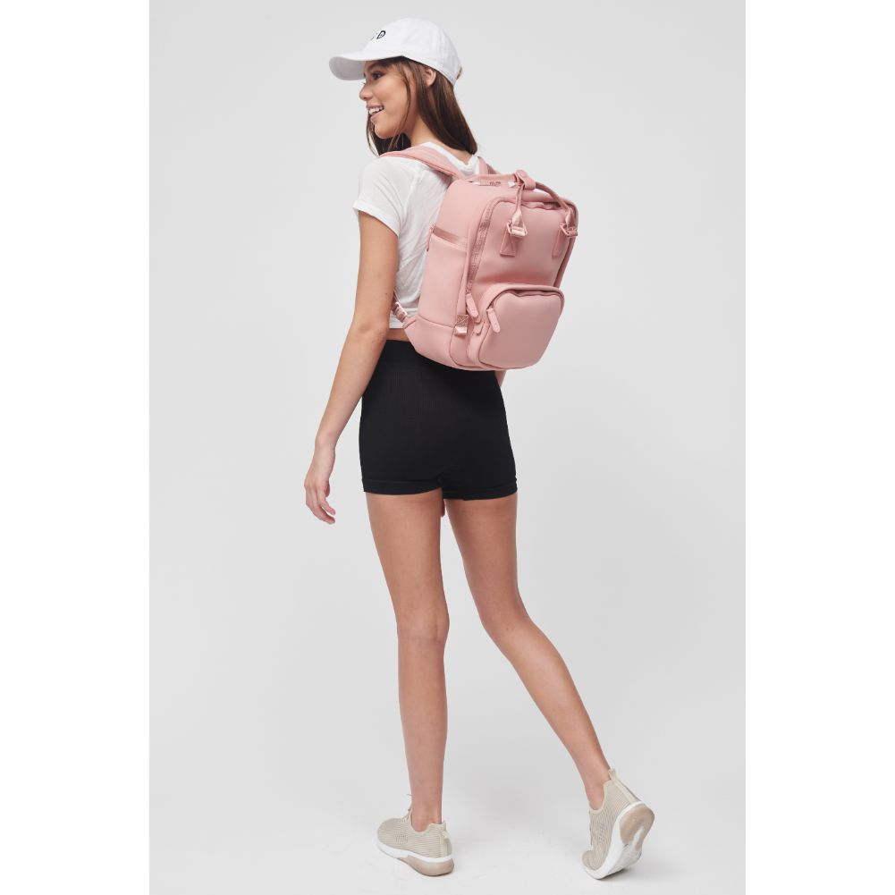 Woman wearing Pastel Pink Sol and Selene Iconic - Neoprene Backpack 841764106696 View 3 | Pastel Pink