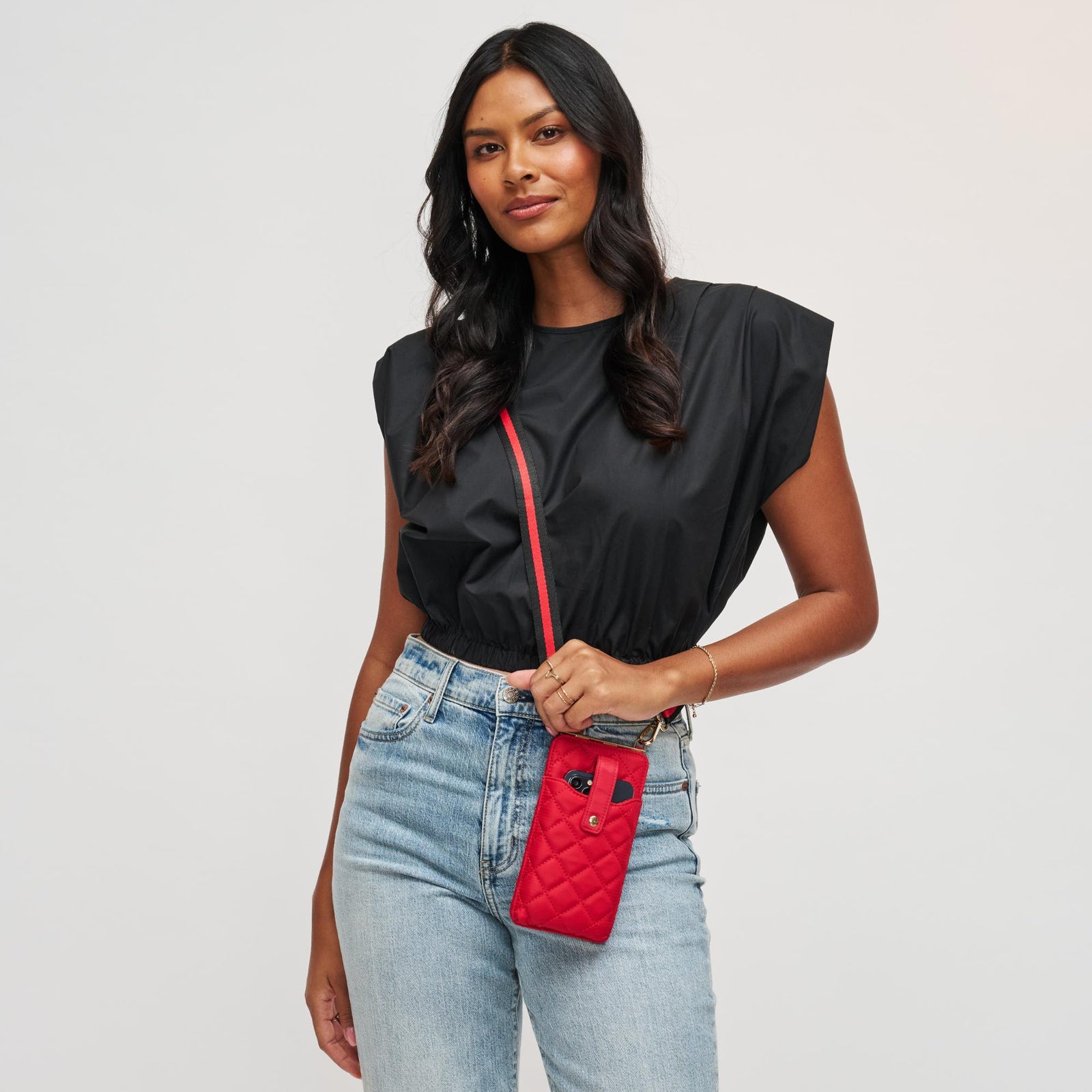 Woman wearing Black Sol and Selene Duality - Quilted Cell Phone Crossbody 840611182265 View 1 | Black