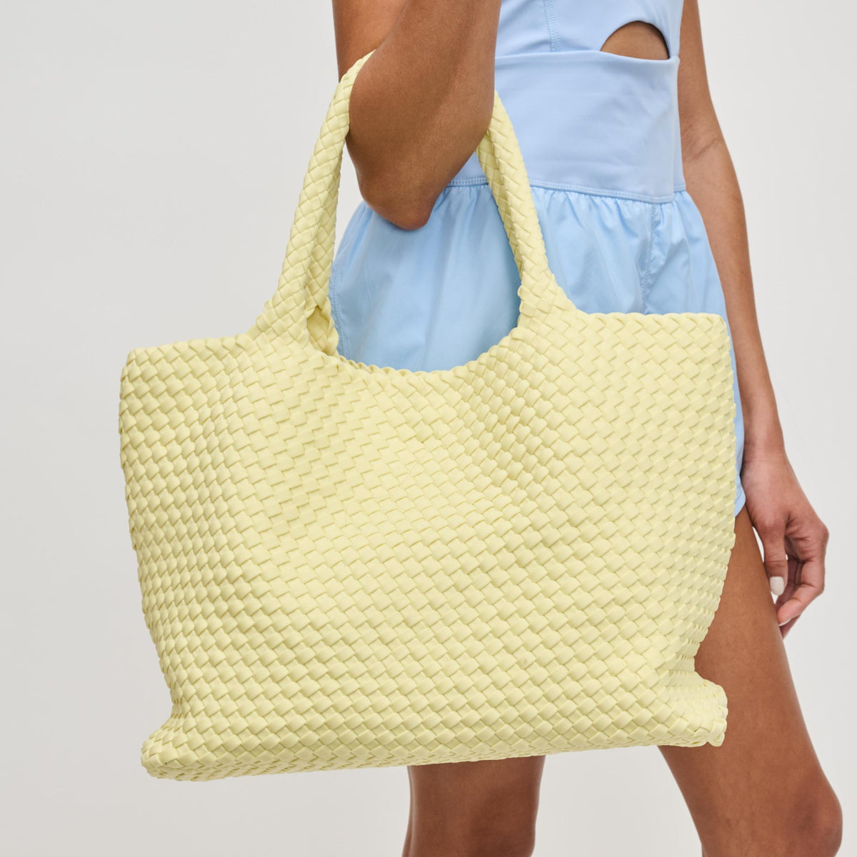 Woman wearing Butter Sol and Selene Sky's The Limit - Large Tote 841764111331 View 4 | Butter