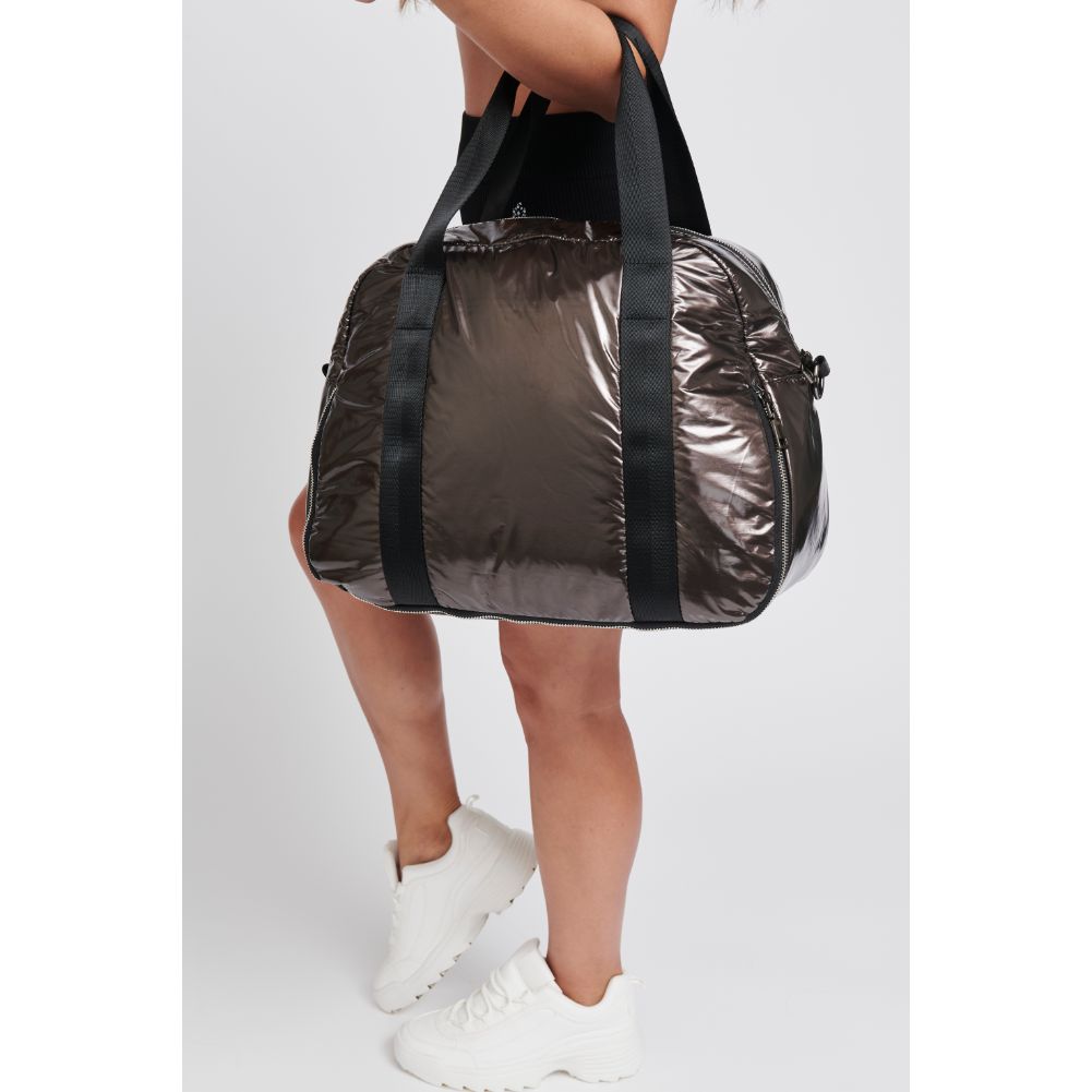 Woman wearing Bronze Sol and Selene Amplify Duffel 841764104920 View 4 | Bronze