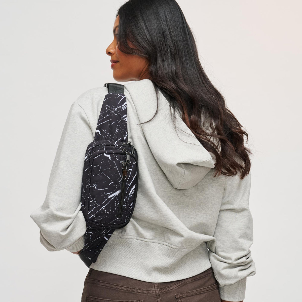 Woman wearing Black Marble Sol and Selene Hip Hugger Belt Bag 841764105804 View 2 | Black Marble