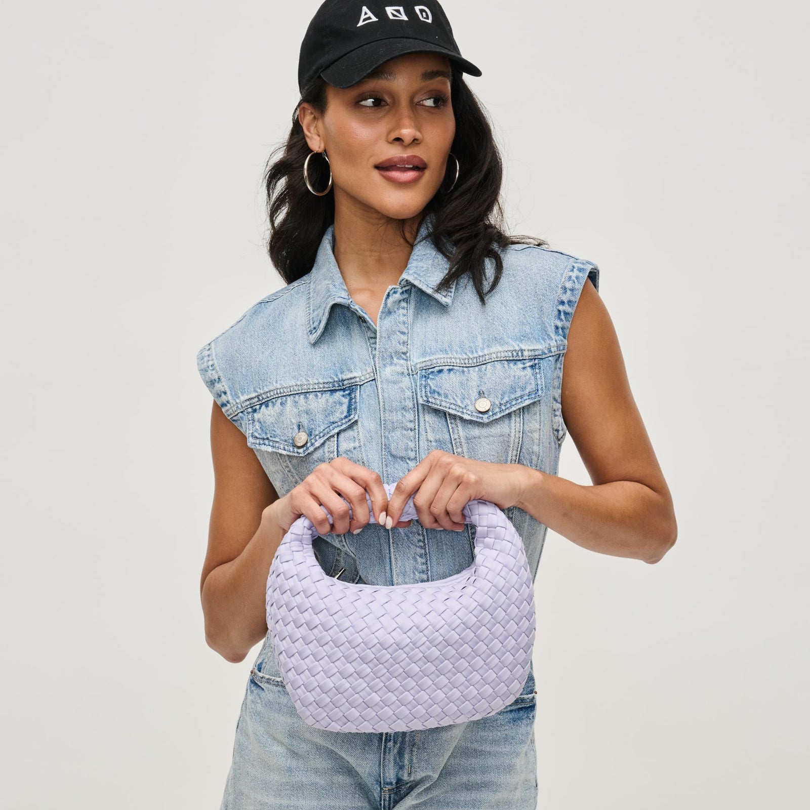 Woman wearing Black Sol and Selene Dare to Dream - Small Woven Neoprene Clutch 841764111072 View 1 | Black