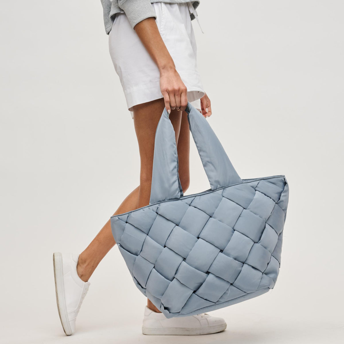 Woman wearing Slate Sky Sol and Selene Intuition East West Tote 841764111867 View 2 | Slate Sky