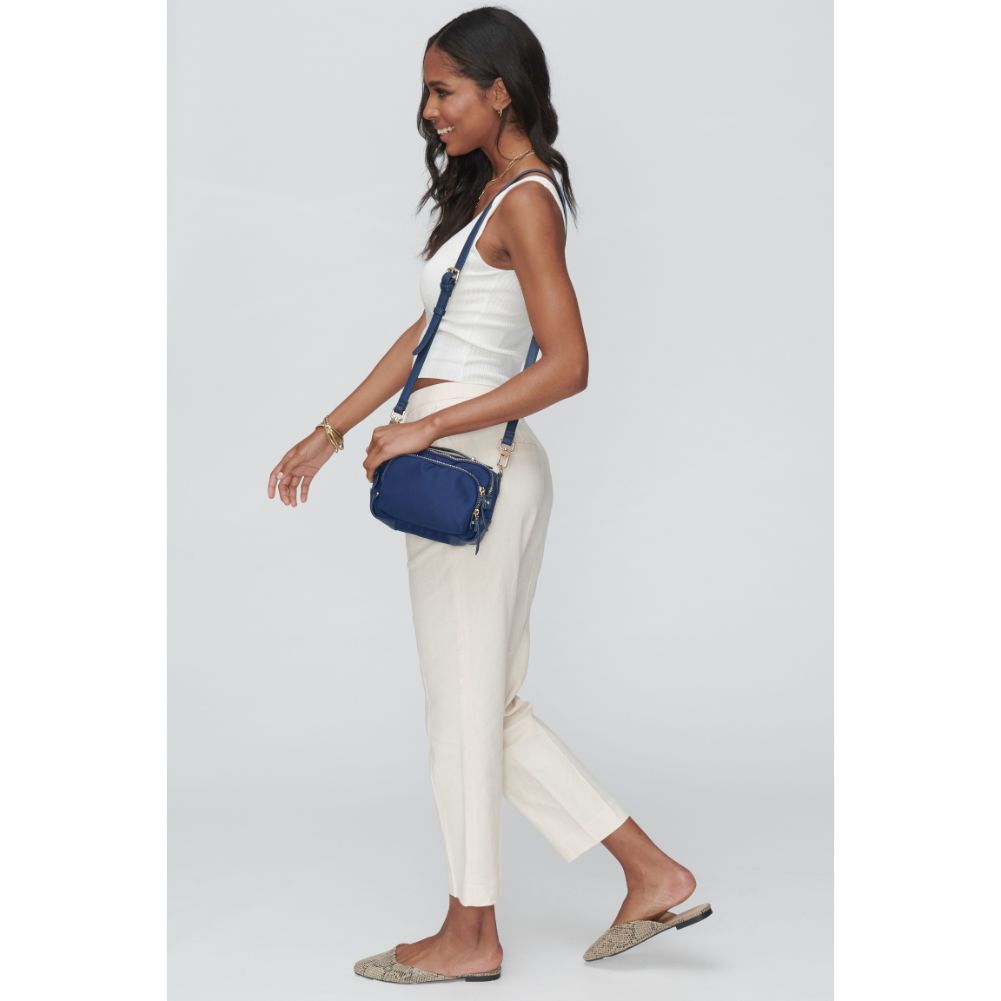 Woman wearing Navy Sol and Selene Pristine - Small Crossbody 841764103688 View 1 | Navy