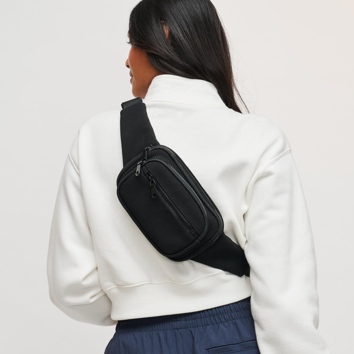 Woman wearing Black Sol and Selene Hip Hugger - Neoprene Mesh Belt Bag 841764109819 View 1 | Black