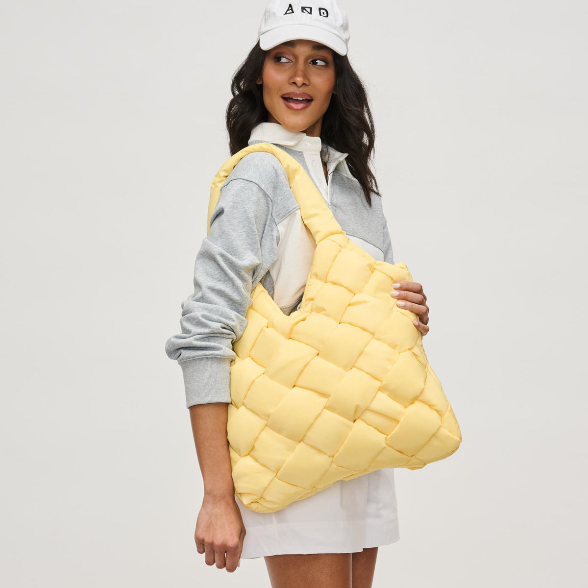 Woman wearing Butter Sol and Selene Illumine Tote 841764111904 View 1 | Butter
