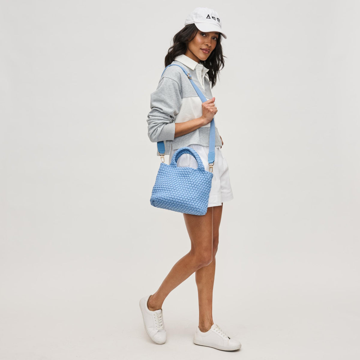 Woman wearing Azure Sol and Selene Sky's The Limit - Small Laced Up Eco-Edition Crossbody 841764111676 View 4 | Azure