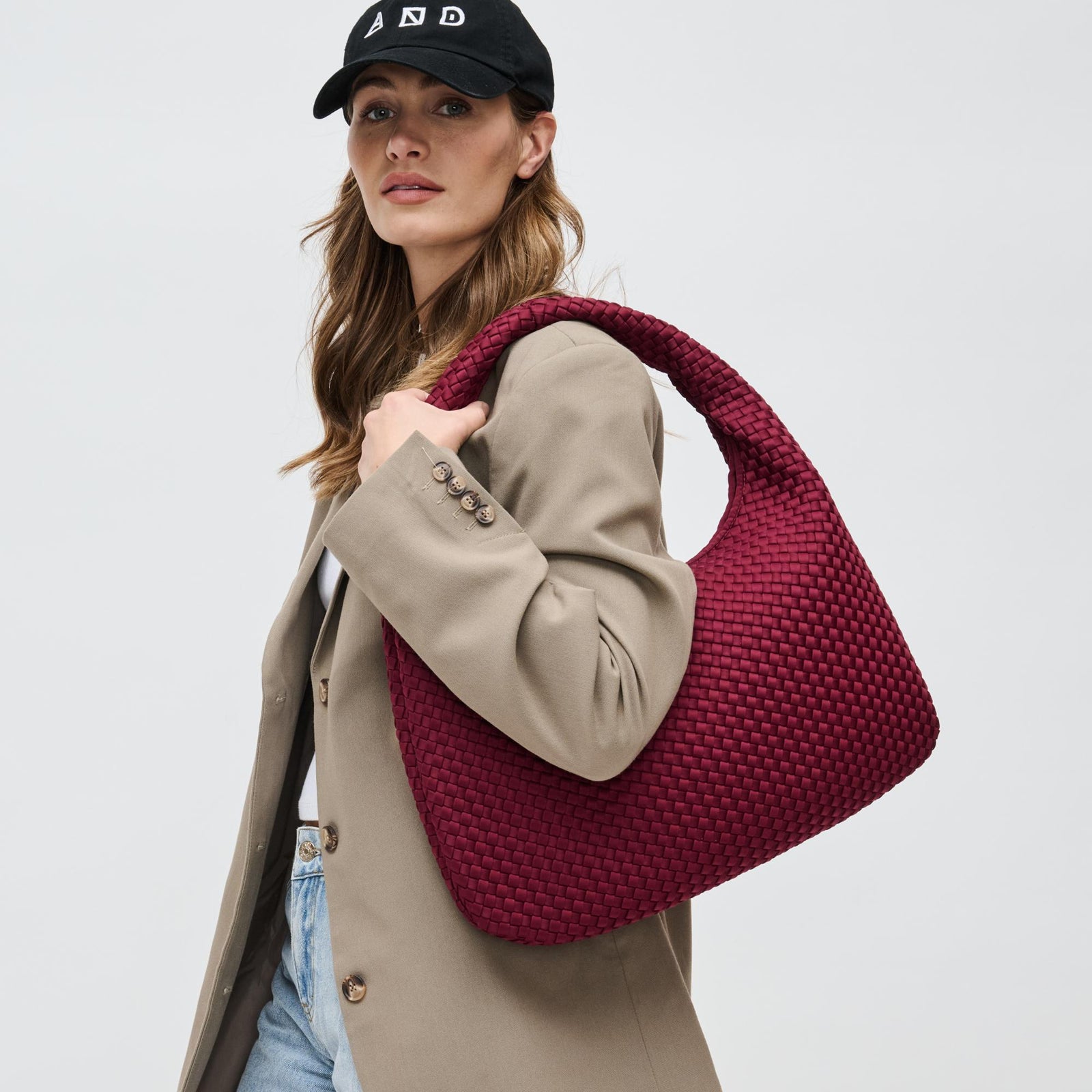 Woman wearing Black Sol and Selene Dare to Dream - Large Woven Neoprene Hobo 841764110914 View 1 | Black