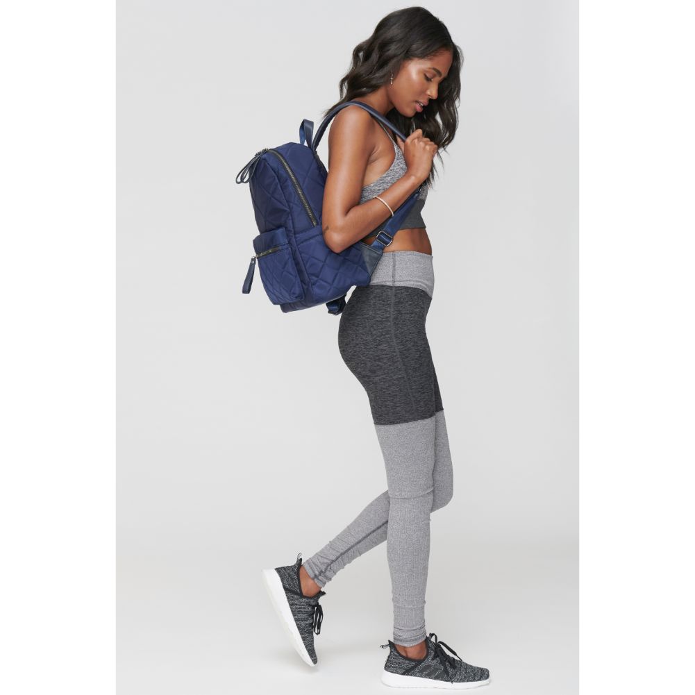 Woman wearing Navy Sol and Selene Motivator - Medium Backpack 841764100847 View 1 | Navy